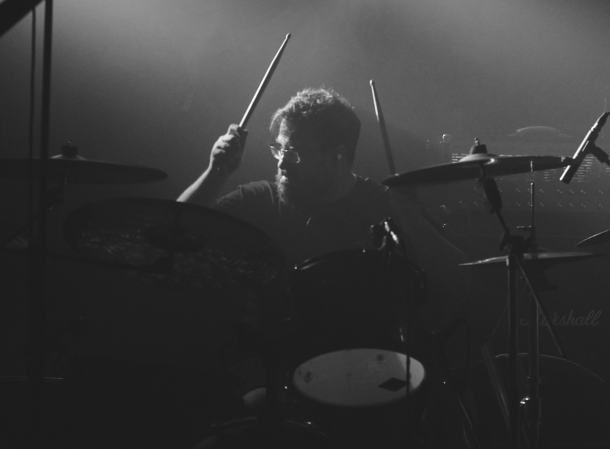 The drummer of the band Kevel performing live on the stage of Temple Athens