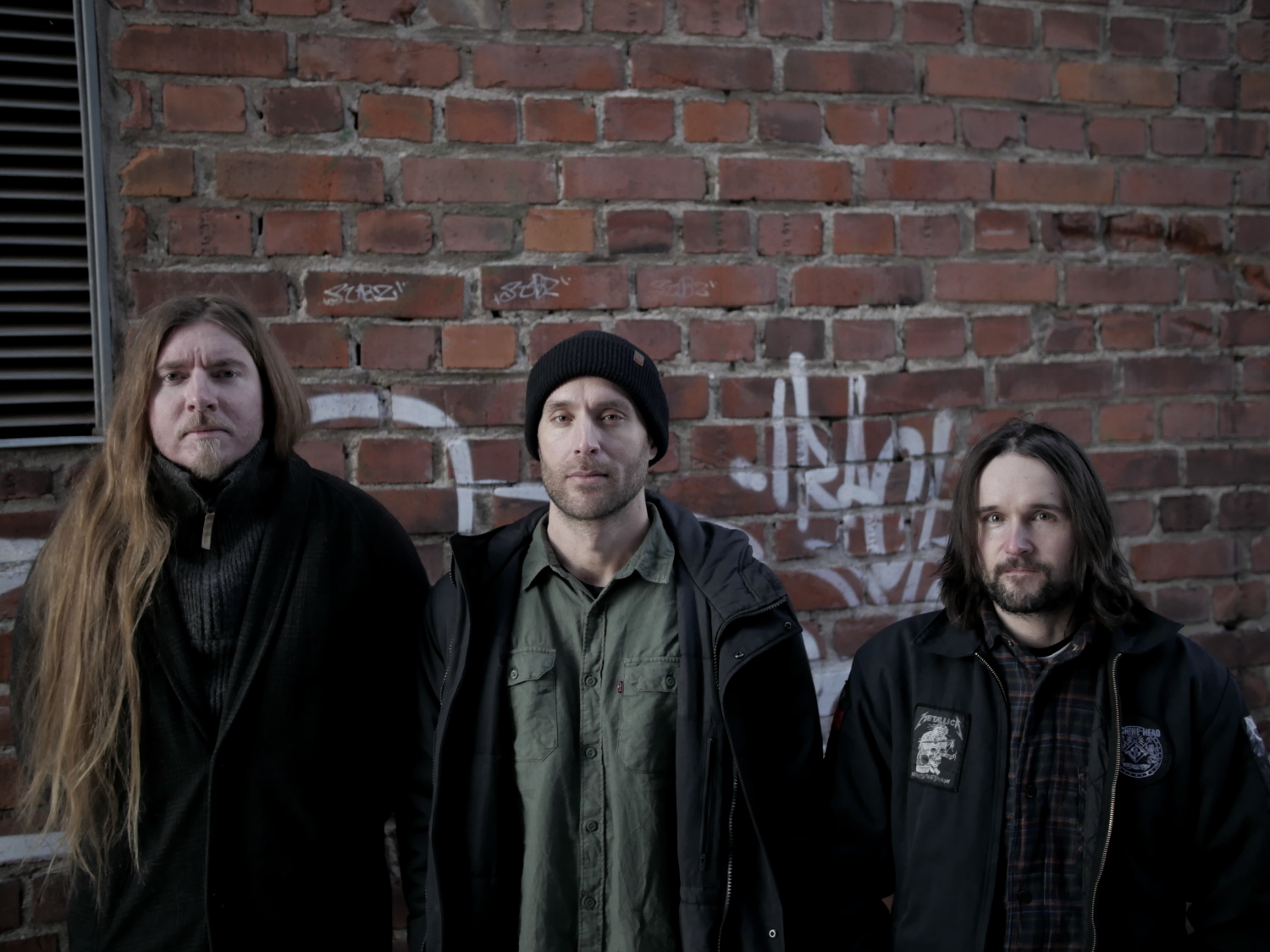 Swedish fuzz rock band Maha Sohona members posing for a photoshoot