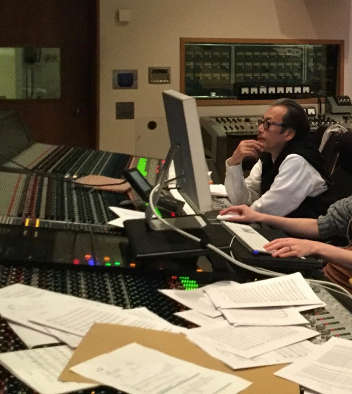 Japanese composer Shigeru Umebayashi in the studio, working on one of his projects